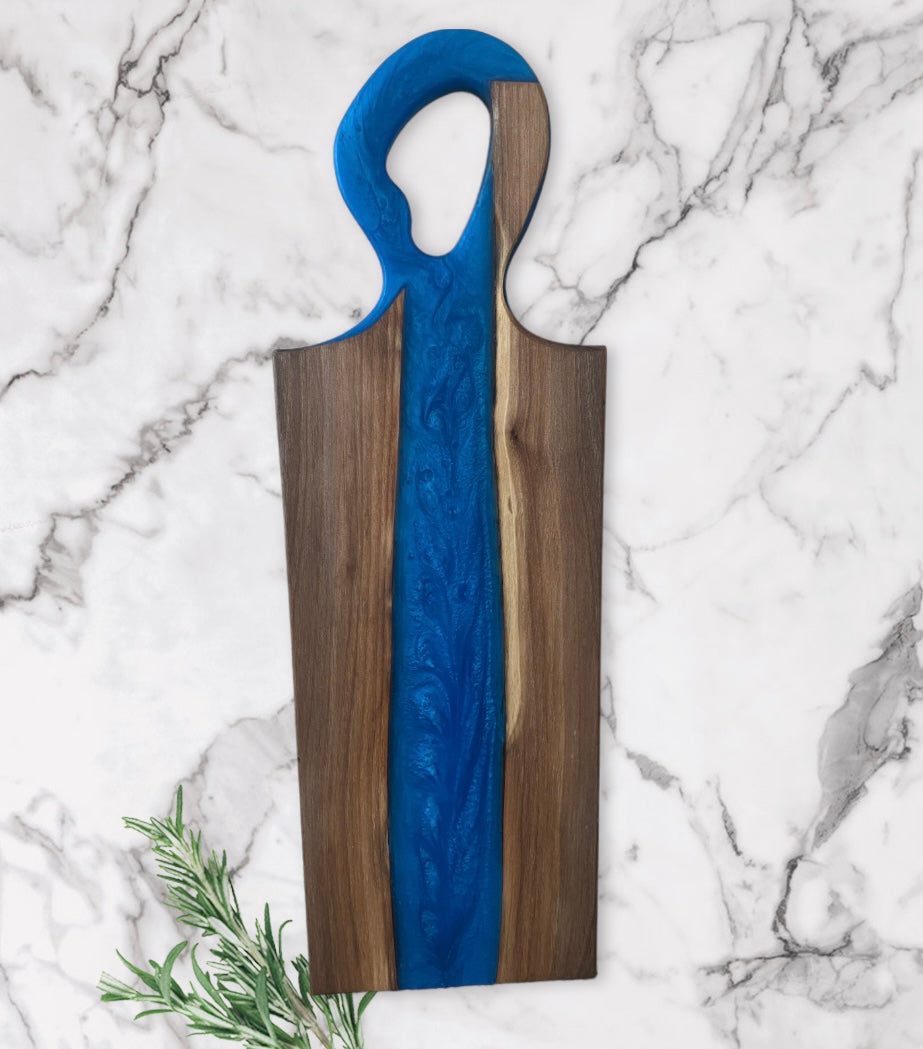 Live edge black walnut and blue river epoxy charcuterie/display board 10”X25”x3/4”